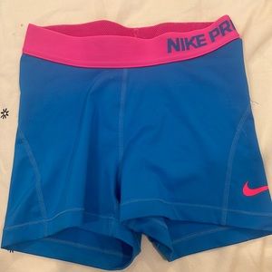 pink and blue nike pro spandex